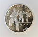 North Korea. 
Olympiad 2004. 
Silver coin 7 
Won from 2002. 
Diameter 38 mm.