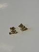 Earrings in 14 
carat gold
Stamped 585
Height 8.08 mm 
approx
The item has 
been checked by 
a ...