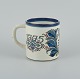 Nils Thorsson for Royal Copenhagen.
Large anniversary mug in earthenware. 1775-1975.