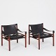 Pair of safari chairs by Arne Norell, model 'Sirocco'. Frame of solid stained ash wood. Back, ...