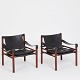 Pair of safari 
chairs by Arne 
Norell, model 
'Sirocco'. 
Frame of solid 
stained ash 
wood. Back, ...