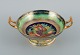 Mintons, England, porcelain bowl with handle. Hand painted with fruits and 
decorated with gold leaf.