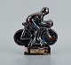 Rambervillers, French ceramic sculpture in the form of a cyclist with beautiful 
eosin glaze.