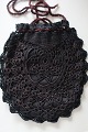 An antique 
beautiful 
handbag, 
handmade 
The closing is 
made with a 
string
Inside there 
is ...