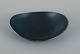 Carl Harry 
Stålhane for 
Rörstrand, 
Sweden, large 
bowl with glaze 
in dark blue 
shade.
Mid 20th ...