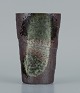 European studio 
ceramicist. 
Unique vase in 
green and white 
glaze on a 
brown 
background.
Approx. ...