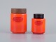 Michael Bang for Holmegaard.
Coffee and tea art glass caddy in orange and white with wooden lids.