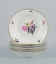 B&G, Bing & Grondahl Saxon flower.
Six deep plates decorated with flowers and gold rim.