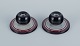 Ilse Claesson 
for Rörstrand, 
two 
hand-painted 
faience 
candlesticks.
1930s.
In great ...
