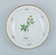 Royal Copenhagen, Flora Danica style. Dinner plate hand painted with floral 
motif and gold decoration.
