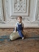 Royal 
Copenhagen 
figure - boy on 
pumpkin 
No. 4539, 
Factory first 
Height 12.5 
cm. 
Design: ...