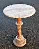 Marble table, 
20th century 
Italy. Pink 
marble. H.: 50 
cm. Dia. plate: 
35 cm.
NB: With minor 
...