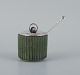 Arne Bang, 
ceramic jam jar 
in grooved 
design. 
Beautiful dark 
green glaze.
1940/50s.
Perfect ...