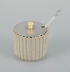 Arne Bang, ceramic honey jar in grooved design. Sand colored glaze.
Model 128.