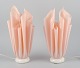 Georgia Jacobs, 
French 
designer, a 
pair of 
rose-coloured 
table lamps in 
resin on a 
marble ...