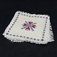 Length 15 cm.A set of 12 beautifully embroidered napkins with different motifs in red and ...