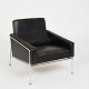 Arne Jacobsen 
"Airport chair" 
in original 
black patinated 
leather, 
chromed steel 
frame.From the 
...