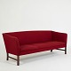 Ole Wanscher 
3-seather sofa 
made by 
P.E.Jeppesen in 
red wool and 
mahogny legs. 
Chhsions with 
...