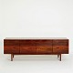 Ib 
Kofod-Larsen. 
FA66 low 
sideboard of 
rosewood.
Front with 
four drawers 
and four doors.
The ...