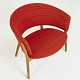 Nanna Ditzel. 
Armchair with 
patinated oak 
frame, curved 
backrest and 
seat, 
upholstered in 
...