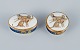 Porcelaine de 
Paris (Décor - 
Chasses 
Royales).
Two small 
lidded boxes 
with brass 
inserts ...