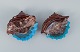Vallauris, 
France, two 
snail-shaped 
bowls glaze in 
shades of brown 
and blue.
1960/70s.
In ...