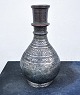 DECORATIVE ANTIQUE ITEM: Afgan kookah. Richly decorated bottle-shaped carafe or vase in copper ...