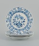 Meissen, a set of four Blue Onion dinner plates.