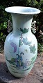 Chinese family 
vert baluster 
vase, 19th 
century 
Polychrome 
decorated with 
women in a 
garden, ...