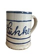 Large, Danish 
earthenware mug 
with handle - 
for sugar. 
White coating 
with blue paint 
under clear ...