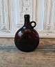 19th century 
bread tin in 
manganese-
coloured glass 
Height 20.5 
cm.