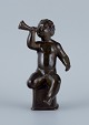 Just Andersen, sculpture in disco metal, naked boy blowing a horn.In excellent condition with ...