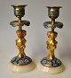 A pair of 
French ormelou 
candelabra with 
enamel work, 
approx. 1880. 
Foot, grommet 
and drip bowl 
...