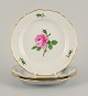 Meissen, 
Germany, three 
plates hand 
painted with 
flowers and 
gold 
decoration.
Approx. ...