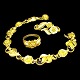 Georg Jensen; A 
jewelry set in 
18k gold,  
bracelet dkr. 
24.000,-,  
brooch dkr. 
8.500,- and  
ring ...