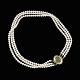 Knud V. Andersen. Three-Strand Pearl Necklace with 14k Gold Lock with Jade.Designed and ...