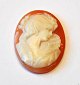 Italian cameo, 
19th century. 
Woman in 
profile. 2.5 x 
2 cm. Unframed.