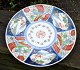 Large Japanese 
Imari dish, 
19th century. 
Decorated in 
blue, red, 
green and 
gilding. The 
center ...