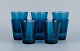 Vereco, France, a set of eight water glasses in blue art glass.Approx. 1970s.In perfect ...