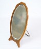 Small table mirror in walnut wood with small metal foot from around the 1880s.Dimensions in ...