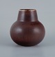 Carl-Harry Ståhlane (1920-1990) for Rörstrand, round ceramic vase with glaze in shades of ...