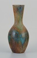 René & Madeleine Valence for La Grange
Aux Potiers, France, unique ceramic vase with beautiful glaze in earth colors 
and blue tones.