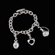 Georg Jensen. Sterling Silver Bracelet #144 with Charms - Henning Koppel.Three Charms: Heart, ...