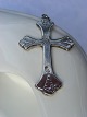 Silver Cross 
828s. Height 5 
cm. width 3 cm. 
Fine condition.