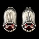 Georg Jensen; Heritage jewellery 2007. Earclips made of sterling silver set with a garnet. H. ...