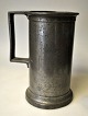 Pewter 
measuring mug, 
19th century 
Denmark. With 
adjustment 
stamps. 
Stamped.: BPH: 
18.5 cm.