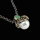 Vilhelm 
Holmstrup. 
Sterling Silver 
& 18k Gold 
Pendant with 
Pearl and Jade.
Oxidized 
Sterling ...