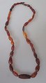 Danish polished 
amber chain, 
assembled 
before 1900. 
Length: 50 cm.