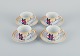 Porcelain de Paris. "Aurore Tropicale". Four coffee cups with saucers decorated 
with flowers.