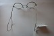 An old pair of glasses incl. case
These pair of glases has a "butterfly" behind the 
ears - please look at the Photoes